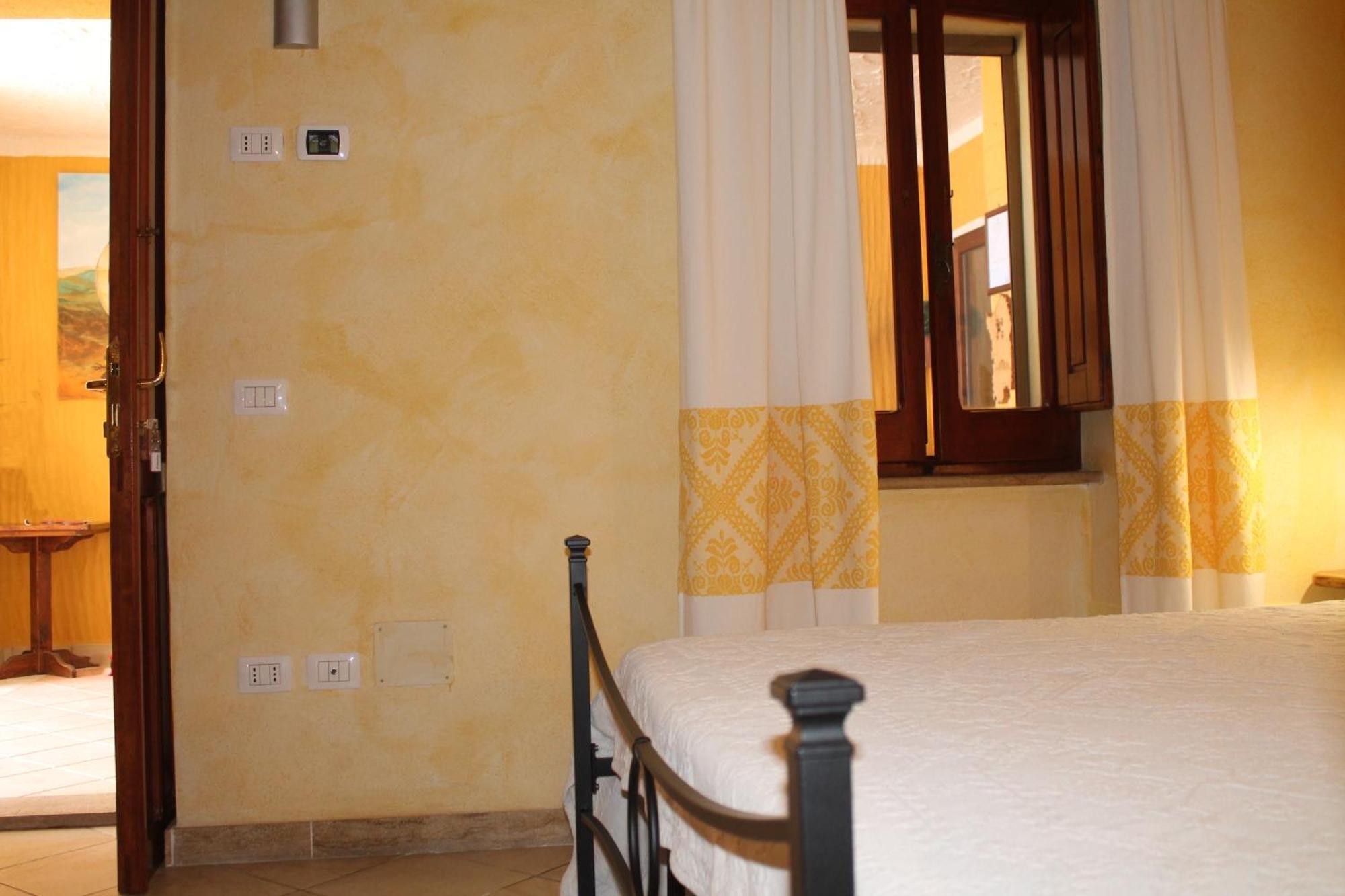 Hotel S'Alzolitta Magomadas Pokoj fotografie