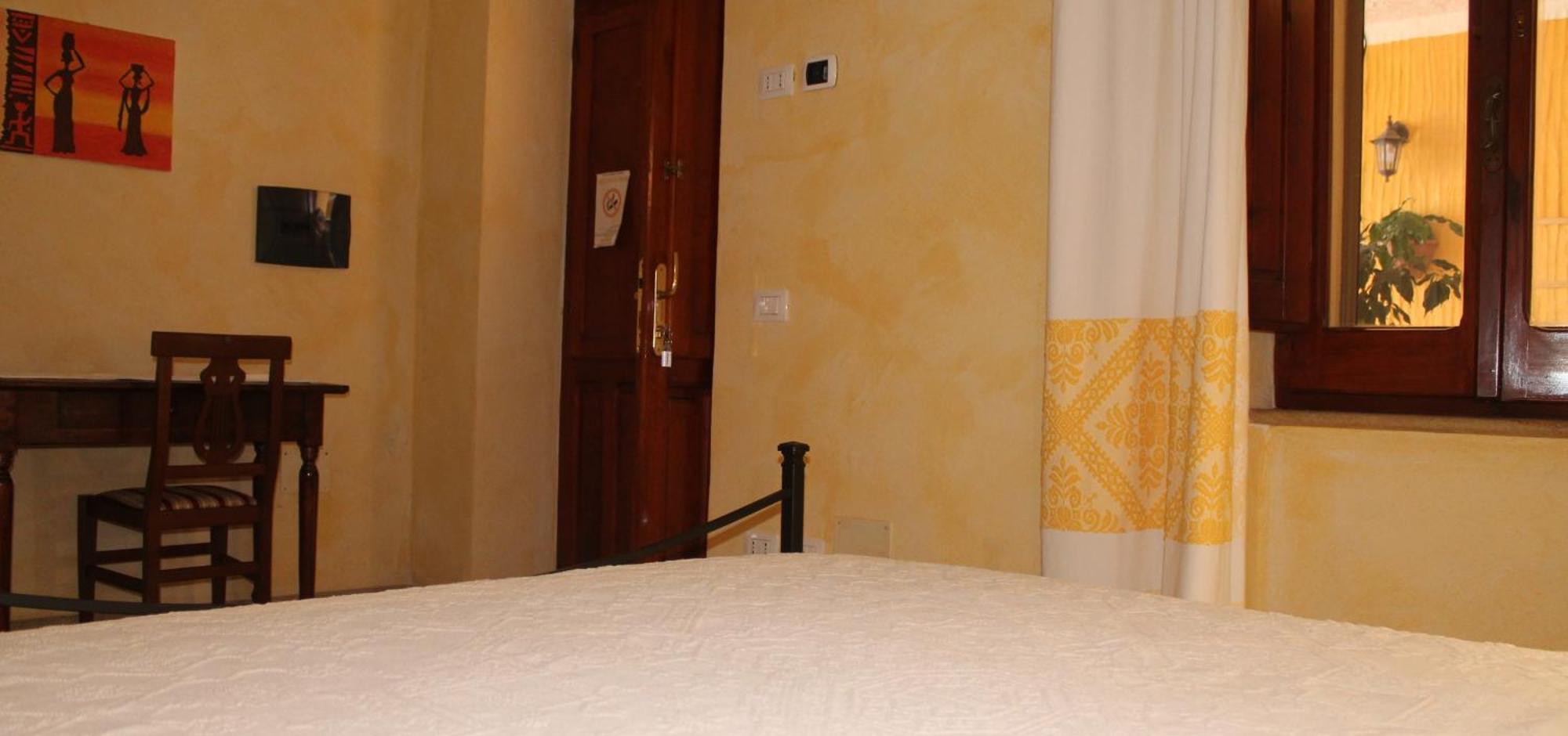 Hotel S'Alzolitta Magomadas Pokoj fotografie