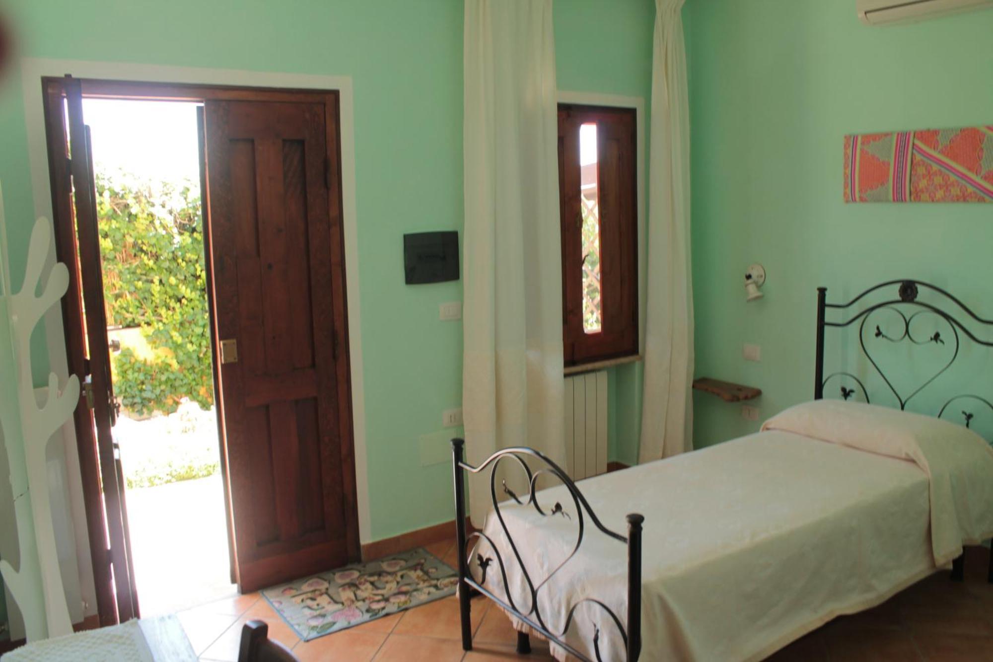 Hotel S'Alzolitta Magomadas Pokoj fotografie